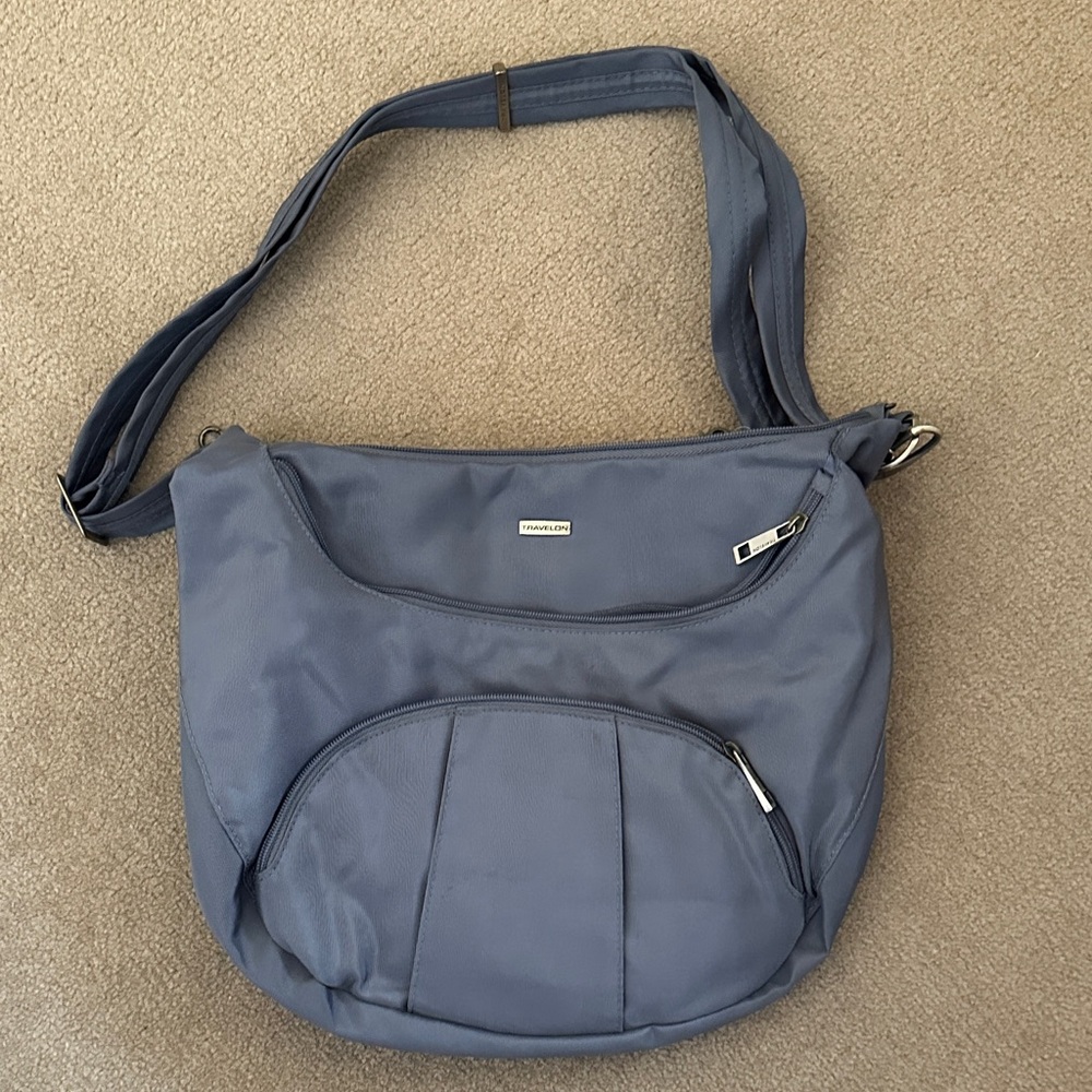 Travelon travel Crossbody Shoulder Bag with security features.
